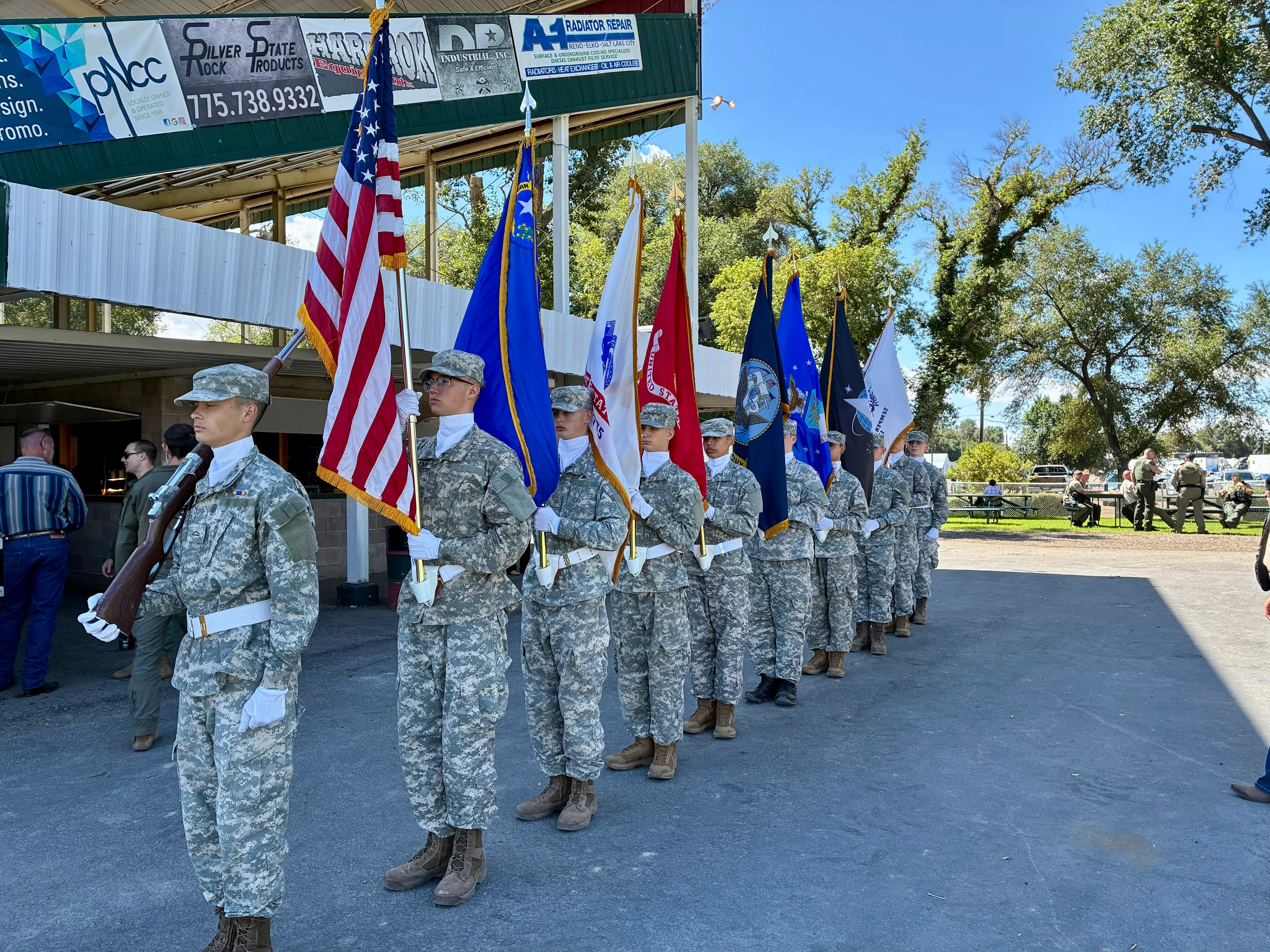 BBYCA color guard presenting flags at a ceremony