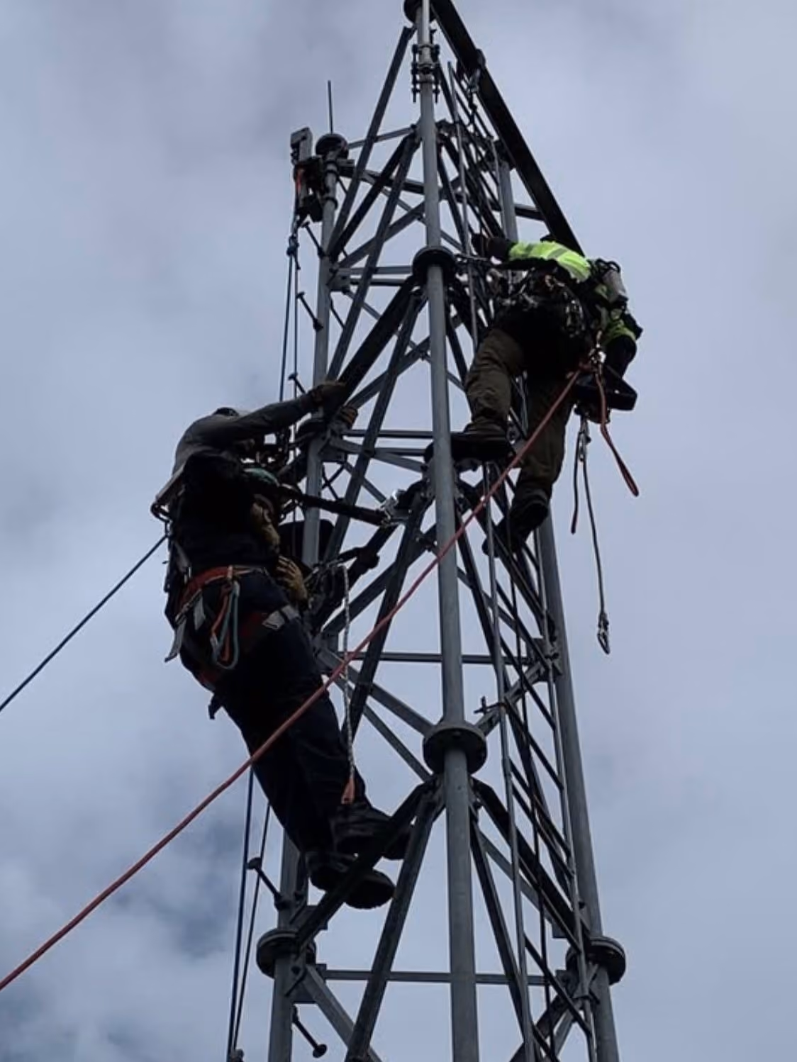 Climbing a lattice tower during tower rescue training