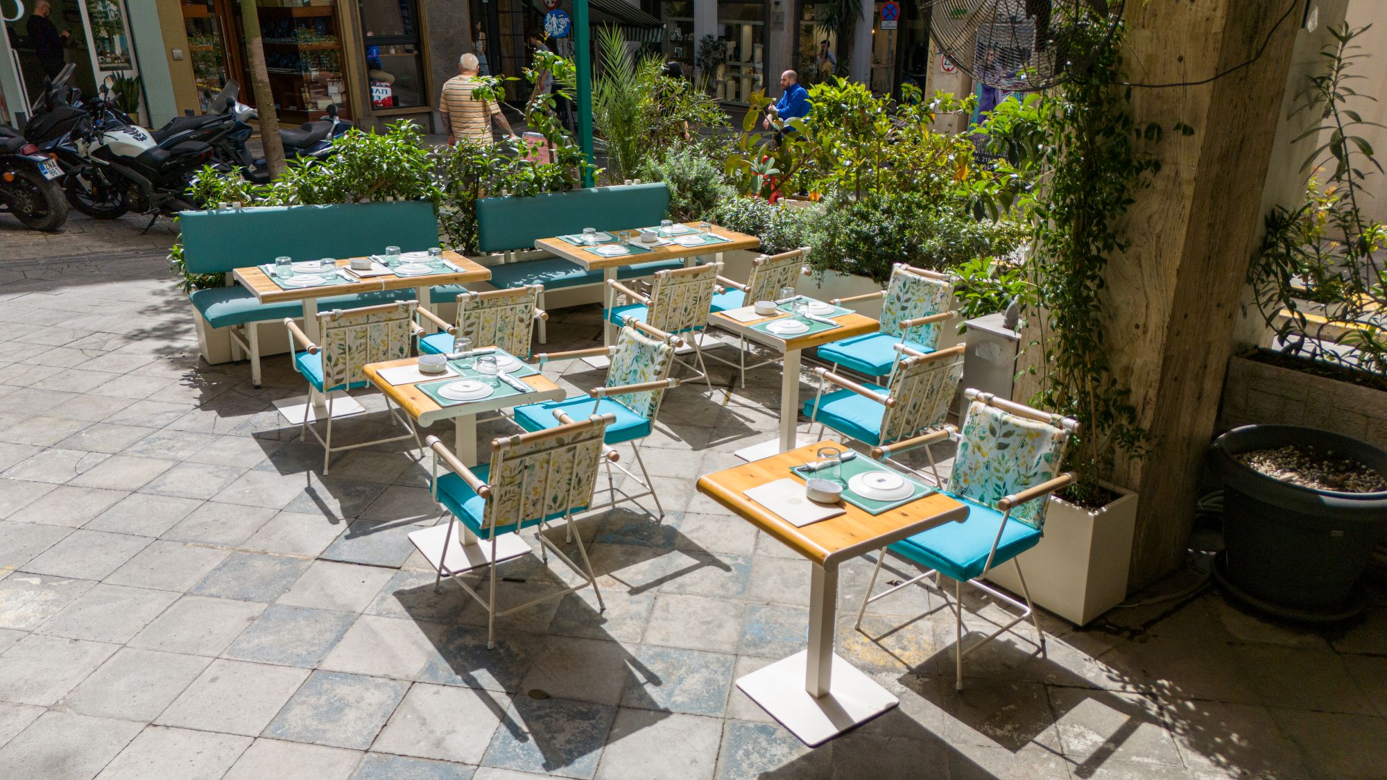 Outdoor tables at The New Era Authentic Greek Cuisine in Athens