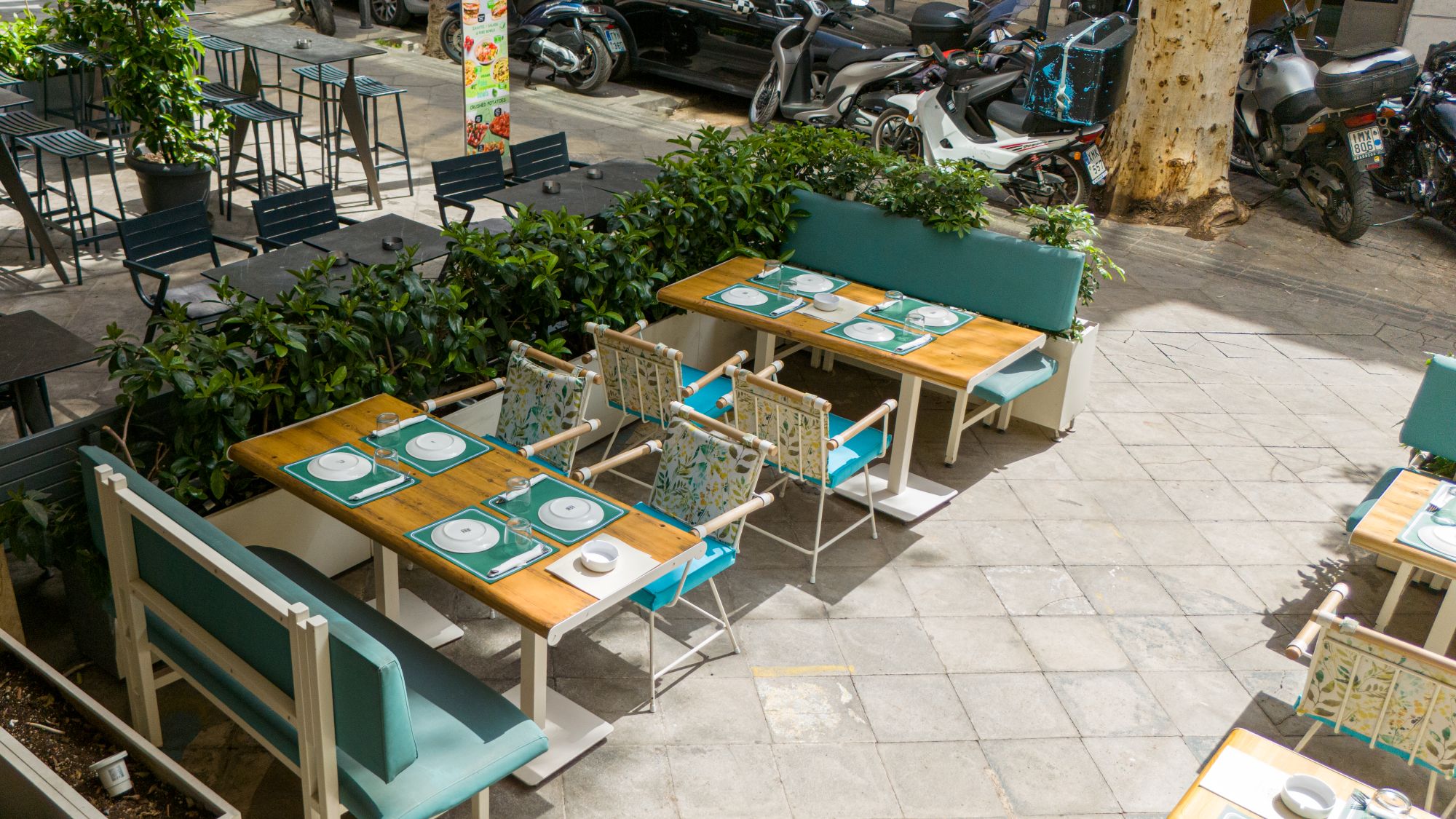 Outdoor dining terrace at The New Era Authentic Greek Cuisine in Athens