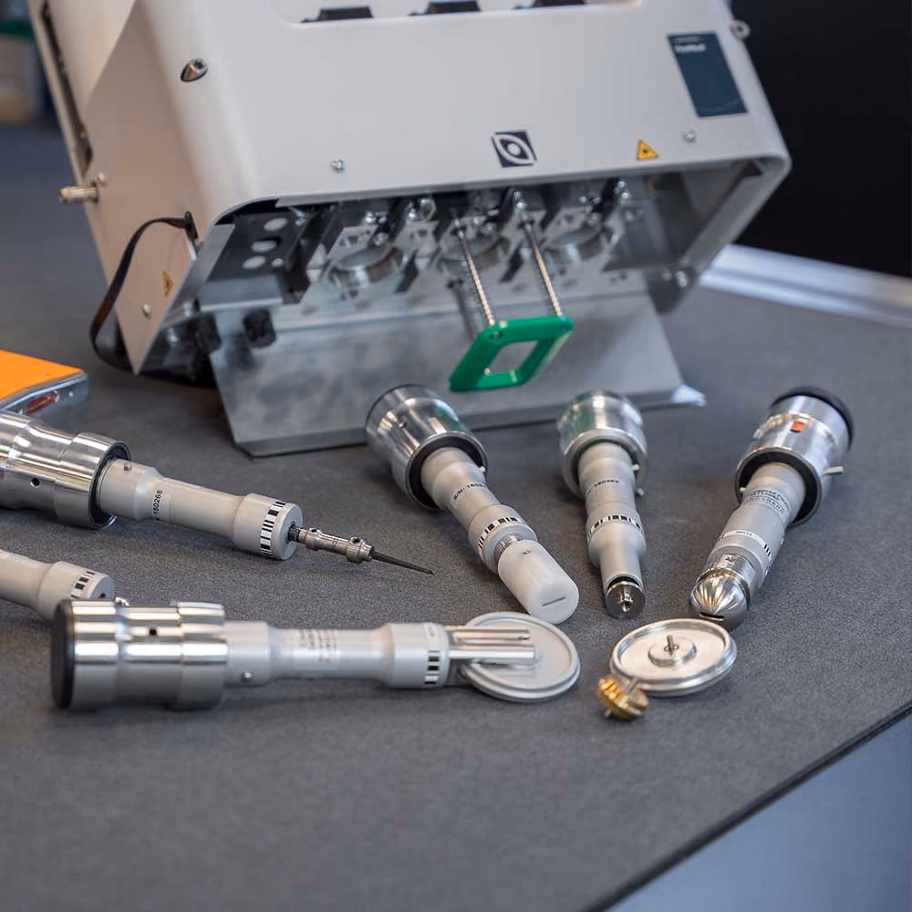 A FlexiHead tool for the Kongsberg X with a selection of tool inserts