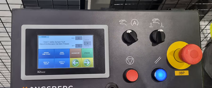 The control panel of a Feeder & Stacker with the AES