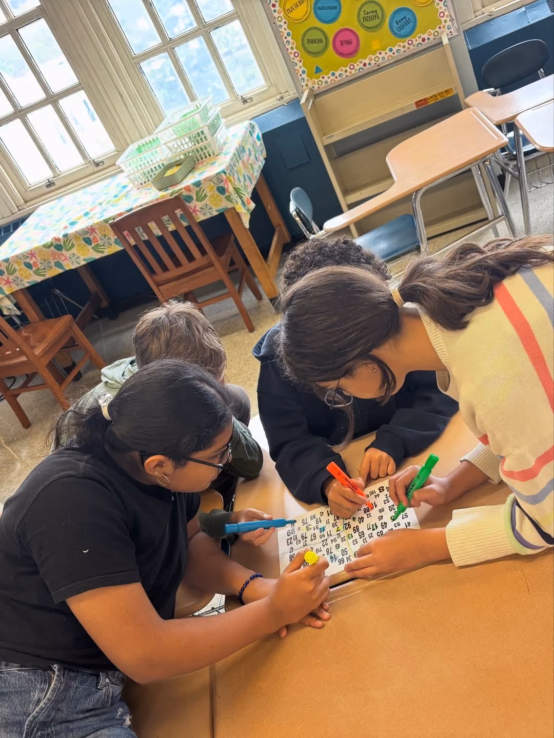 Seventh graders working together on a problem-solving activity