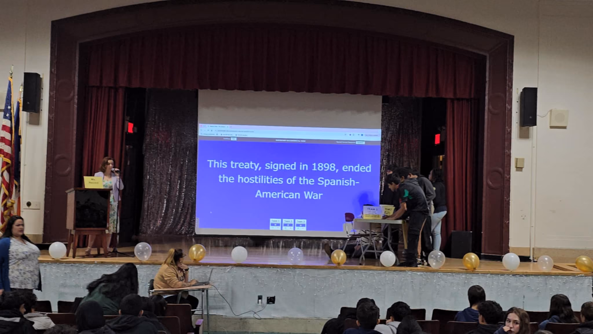 Jeopardy question projected on the auditorium screen during MAA and RBG Jeopardy