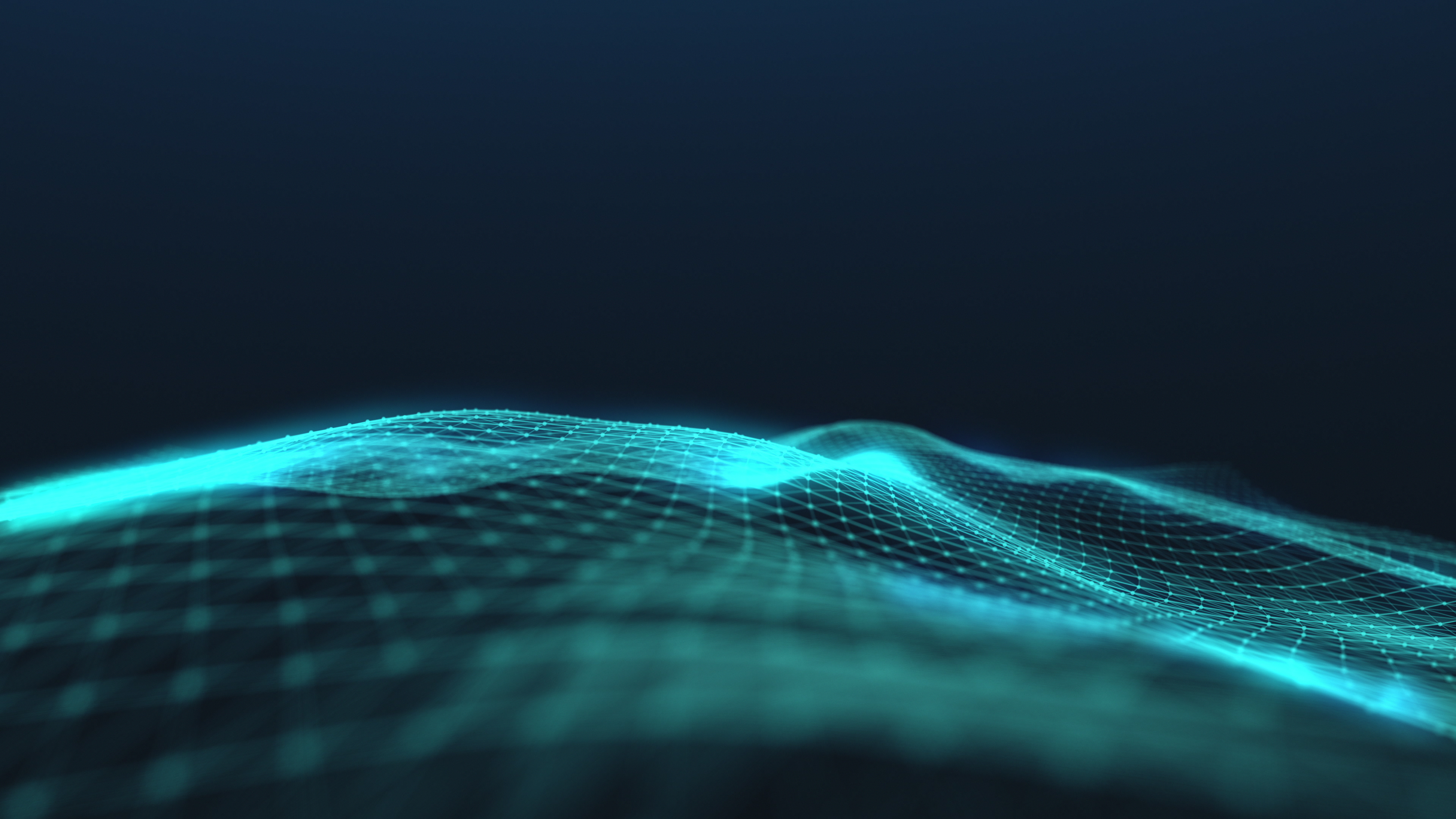 Glowing blue digital mesh grid forming a wave pattern on a dark background.
