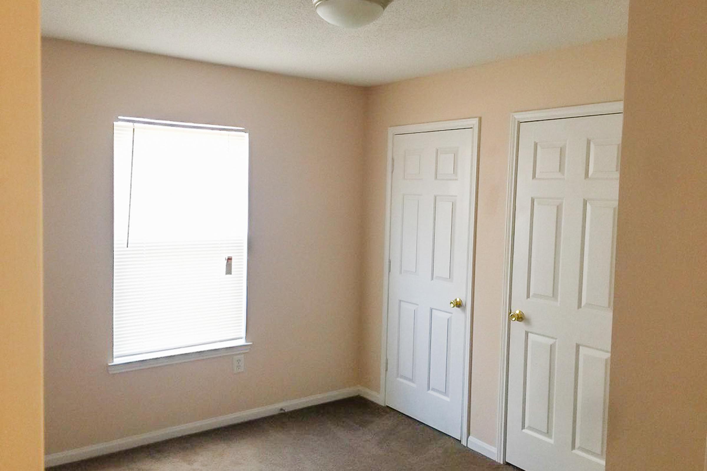 Bedroom with large window