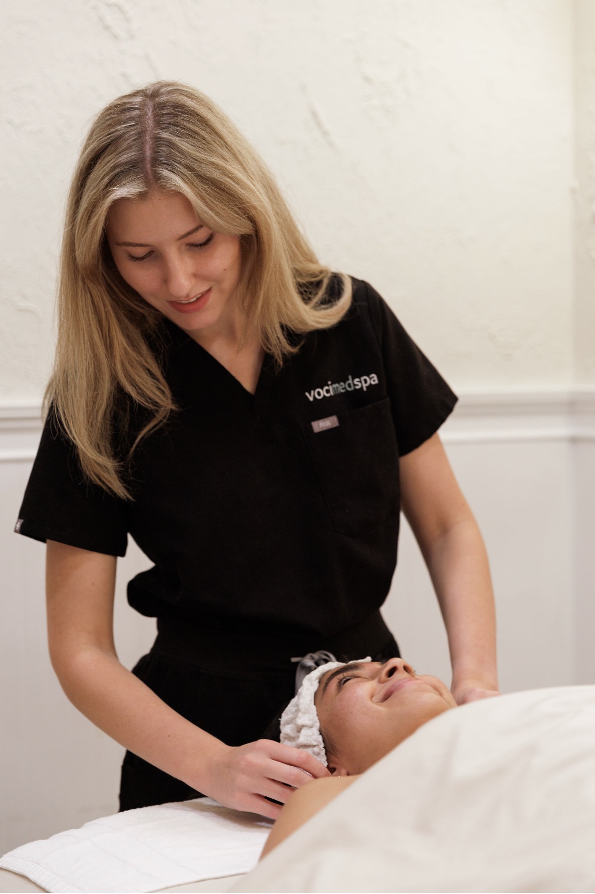 Voci MedSpa provider treating a client