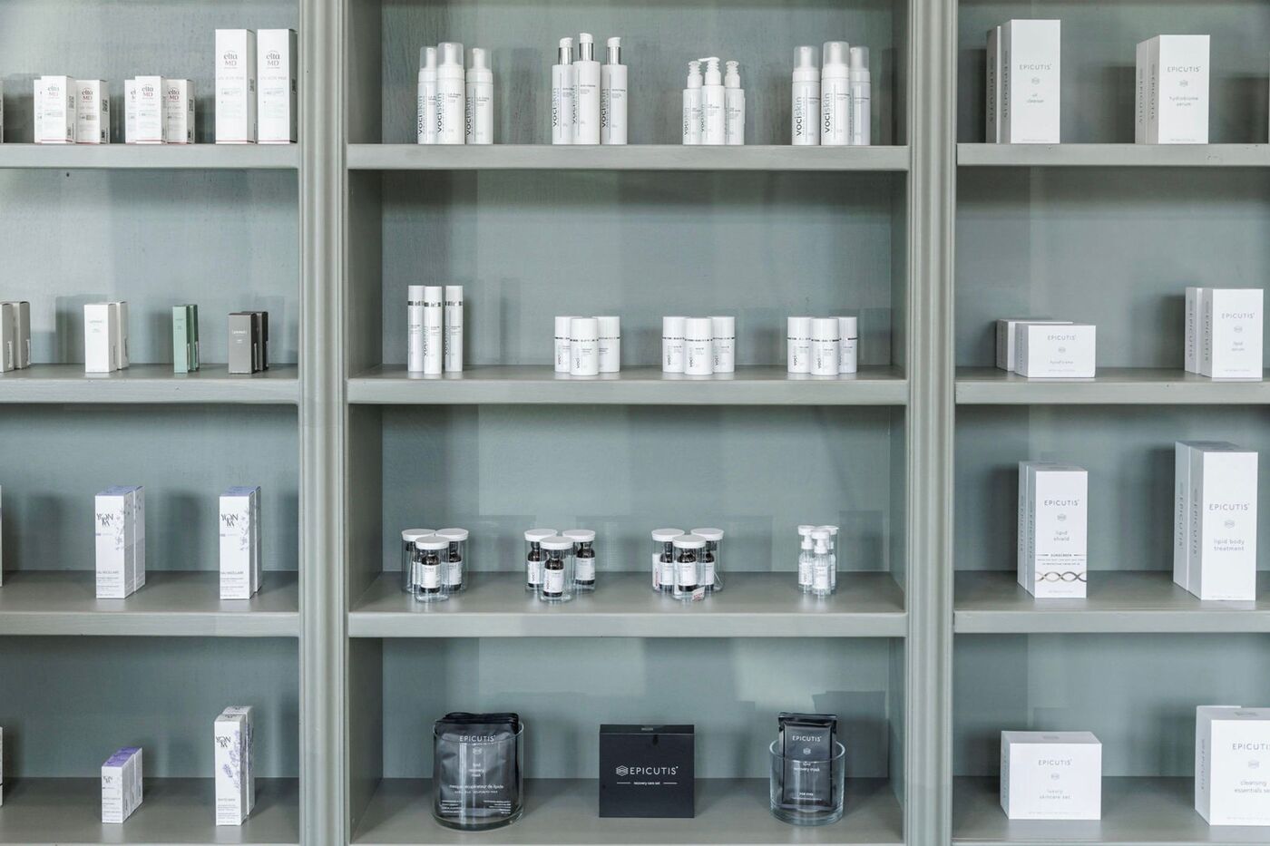 Skincare products on Voci's retail shelving