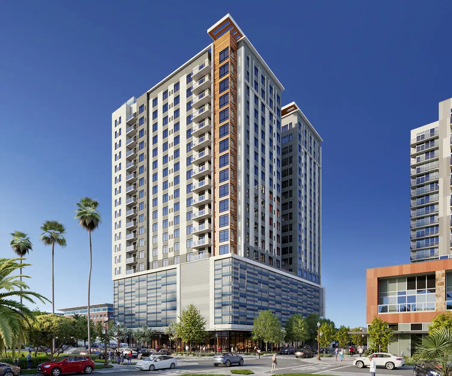 Multifamily residential building with modern facade and landscaping.