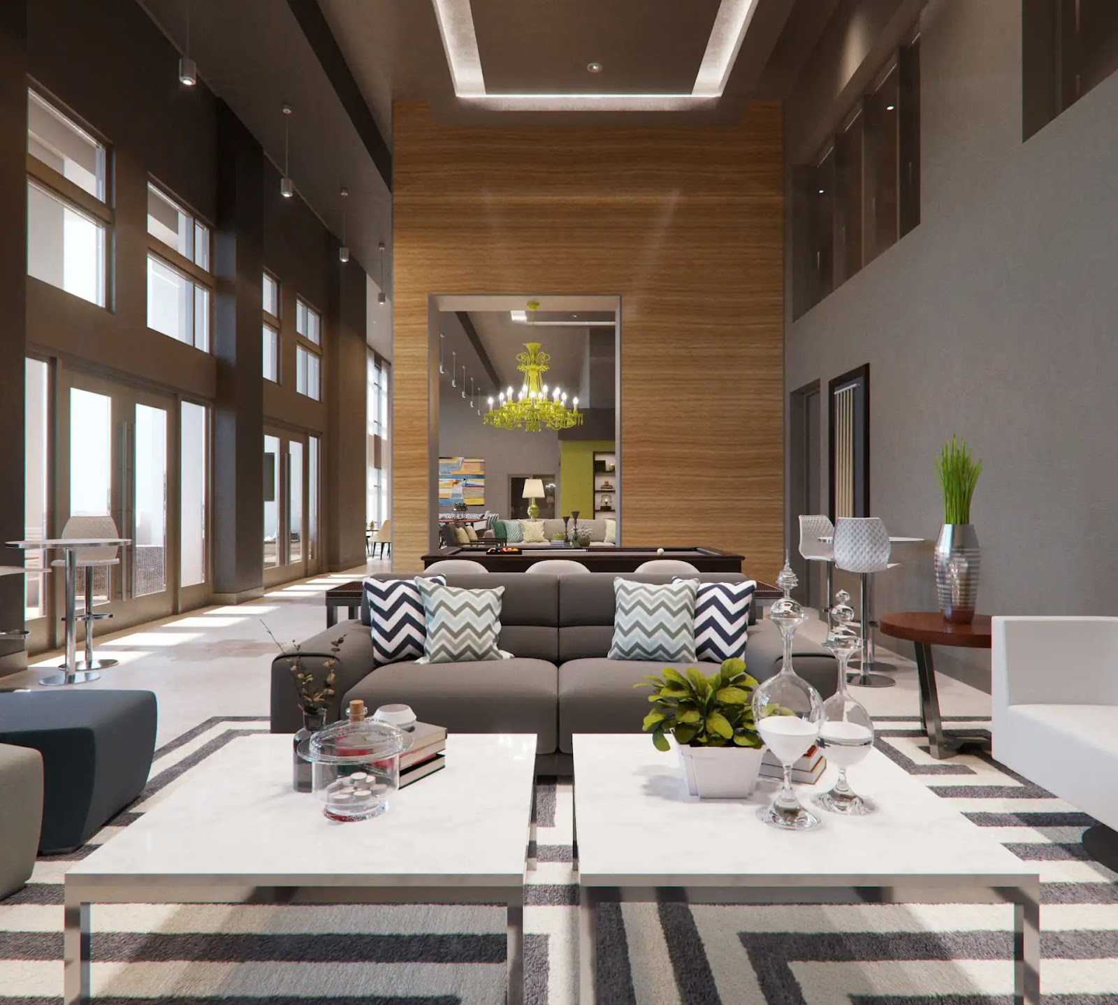 Modern amenity lounge with stylish furniture and large windows.