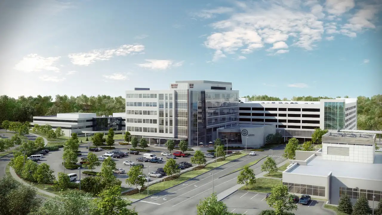 Rendering of a modern commercial complex with landscaped surroundings.