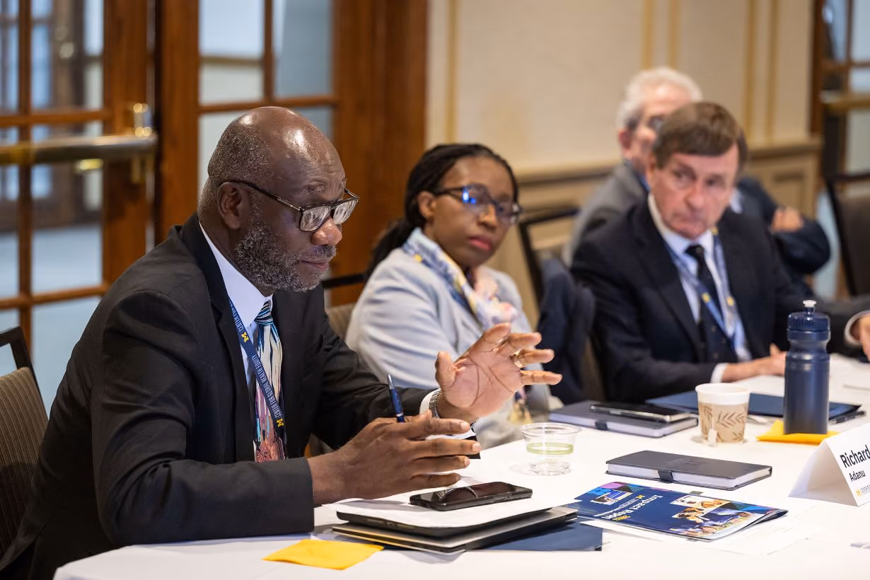 Man speaking at board meeting for Center for Global Health Equity at University of Michigan