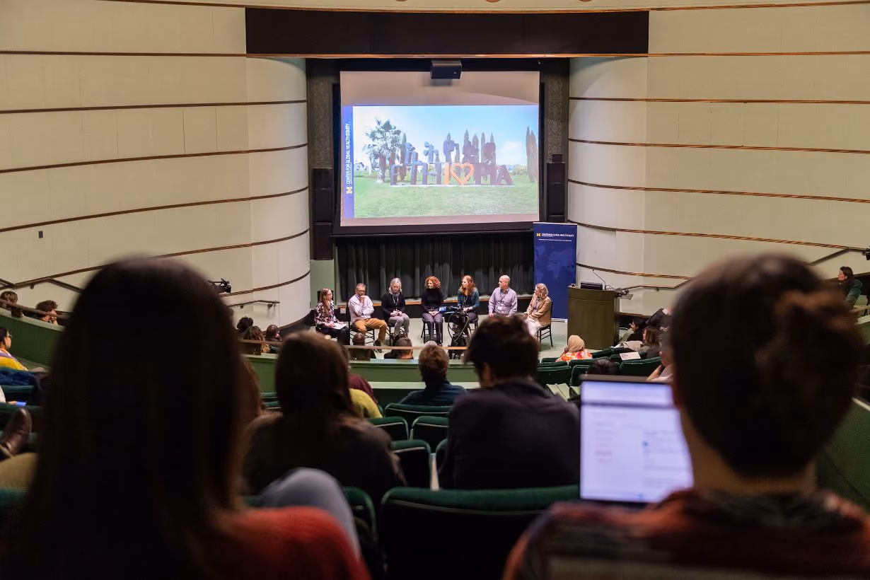 Audience view of screen at Global Health Equity research symposium at University of Michigan