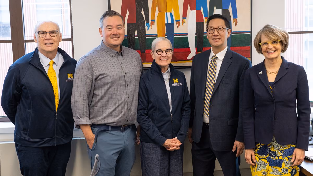 Founder Tachi Yamada posing with 4 members first day at Center for Global Health Equity