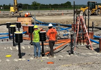 project workers with equipment all around