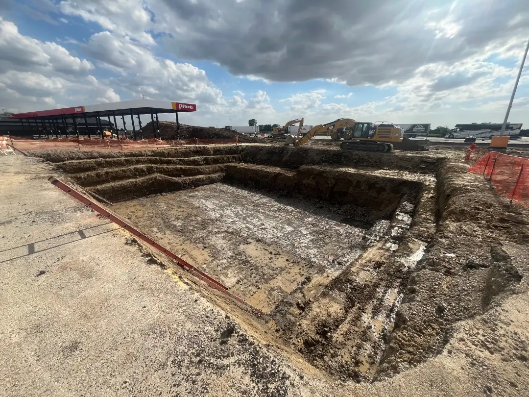 excavated site dug out by pilot gas station