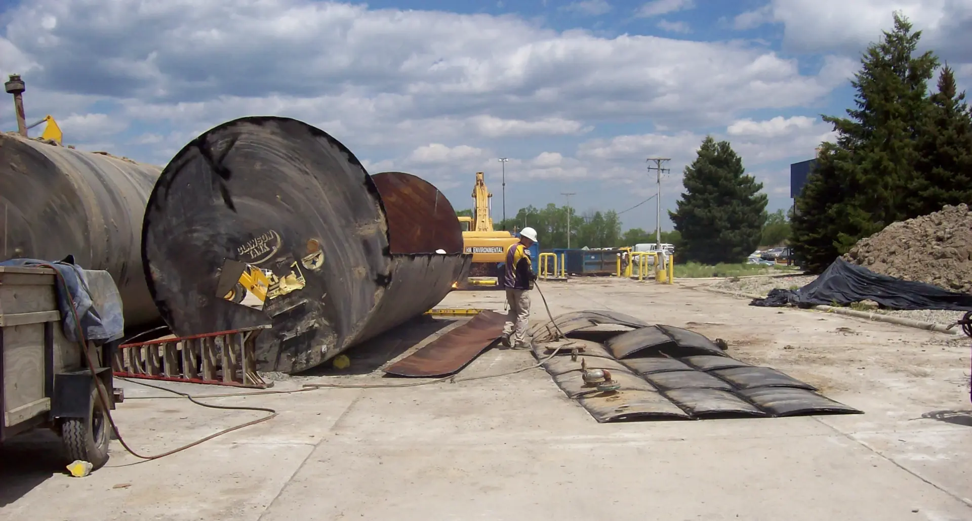 tank above ground being removed