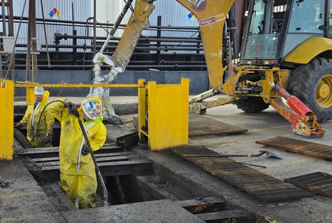 cleaning under industrial floor panels