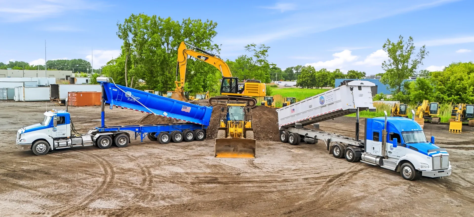 hm equipment vehicles in formation