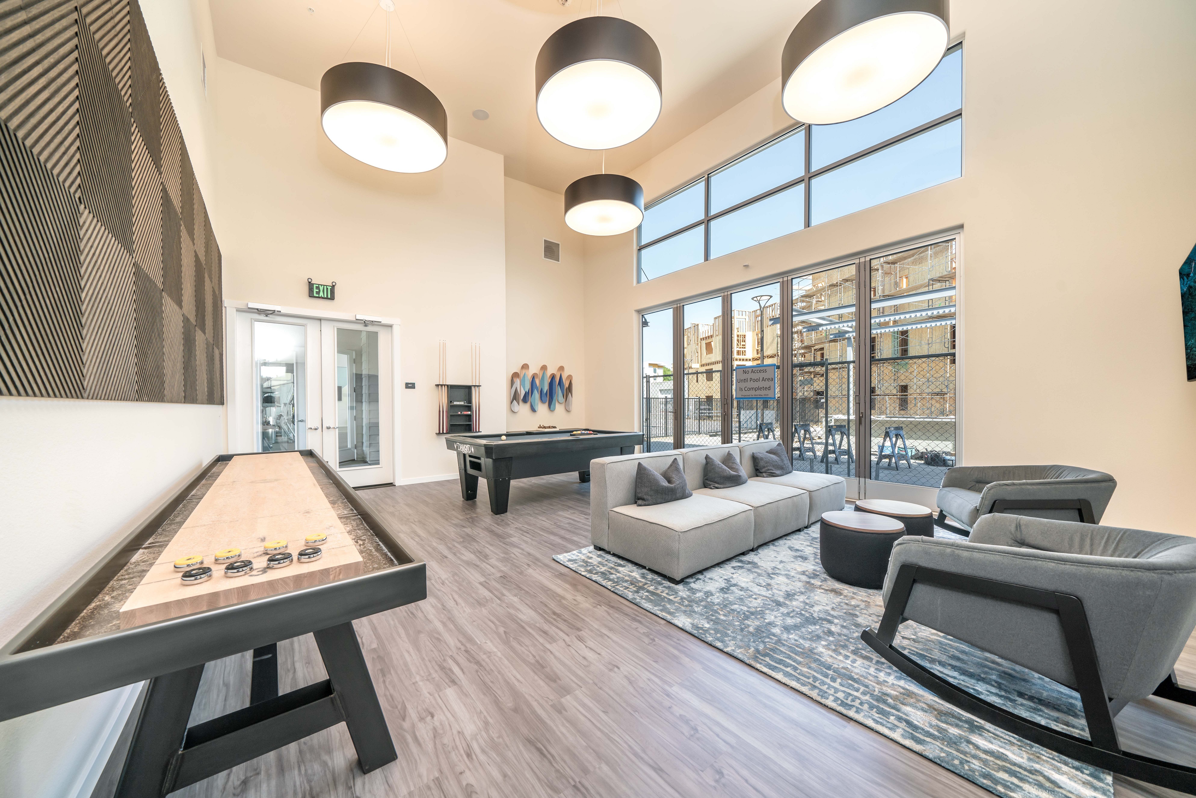 Game room with pool table and shuffleboard