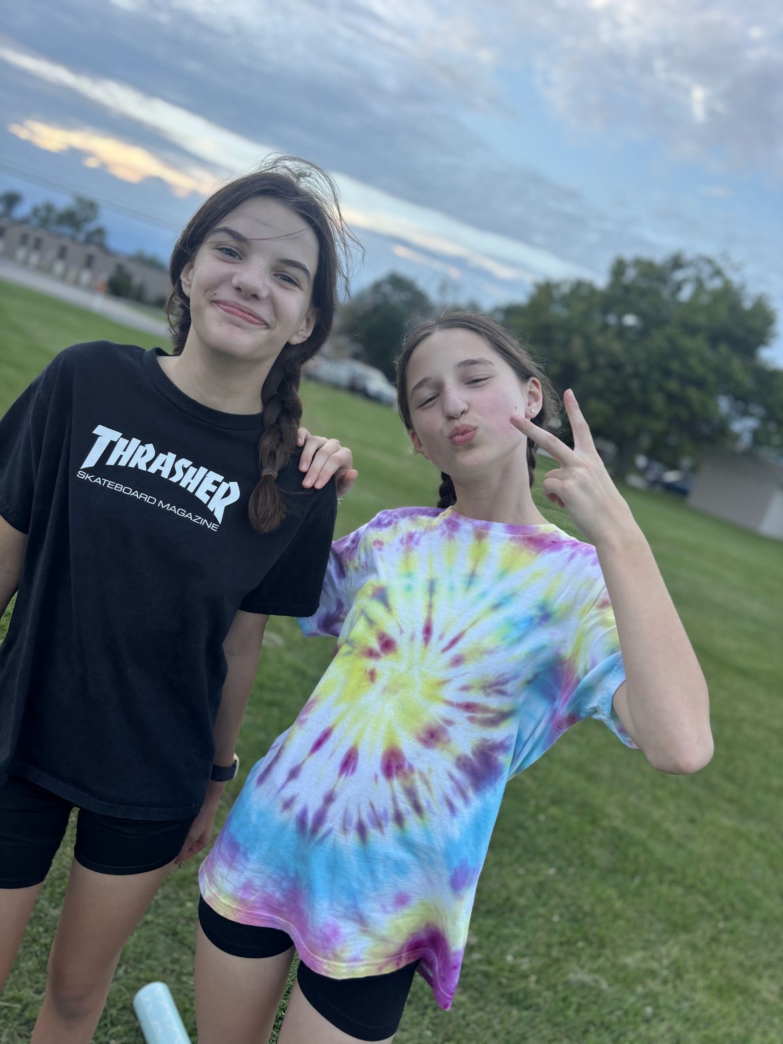 Two friends make faces for the camera after a clinic.