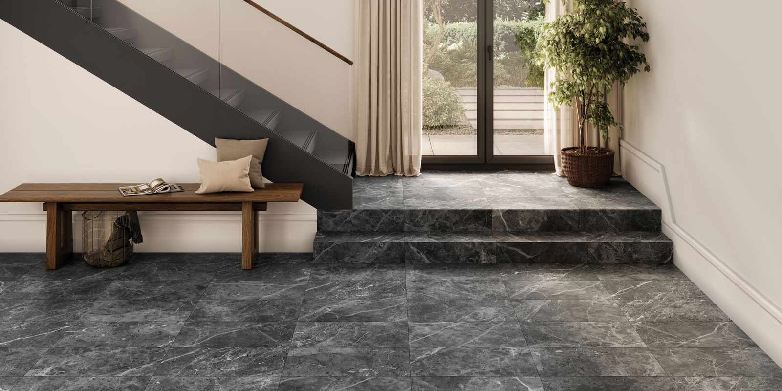 Interior with gray marble floor and steps, wooden bench, staircase, potted plant by glass door.