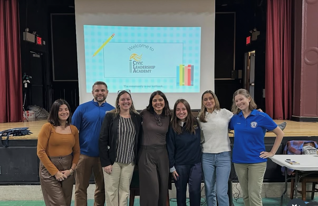 Staff and students posing at Civic Leadership Academy welcome event
