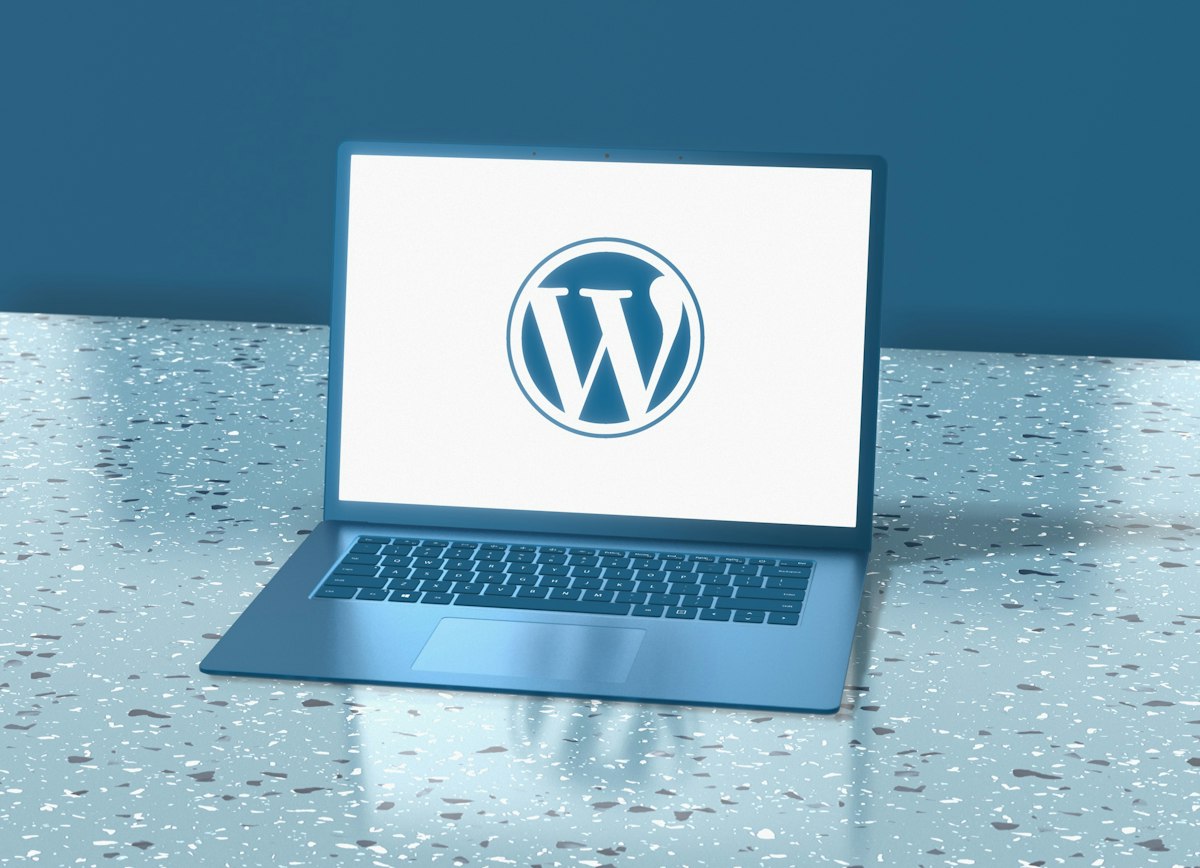 Laptop displaying the WordPress logo