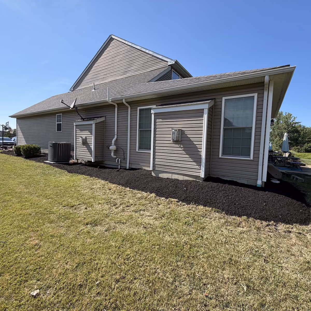 Fresh mulch installation for professionally maintained landscape beds in Northeast Ohio