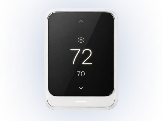 Smart thermostat on the living room wall