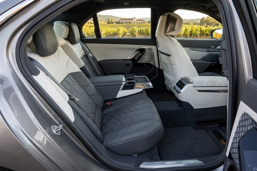 BMW 7 Series rear cabin with leather seats overlooking a vineyard