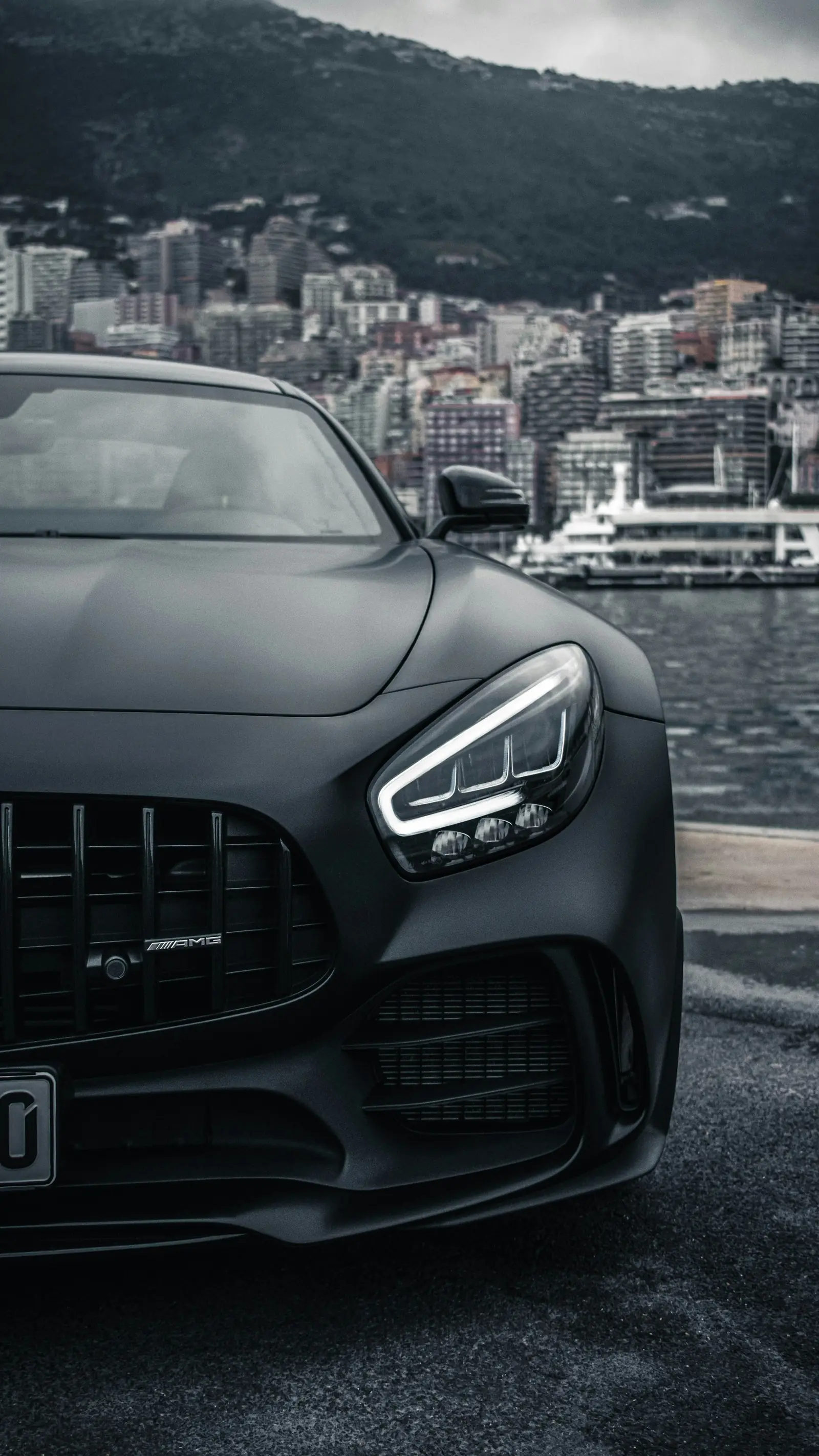 Black executive sedan on the road