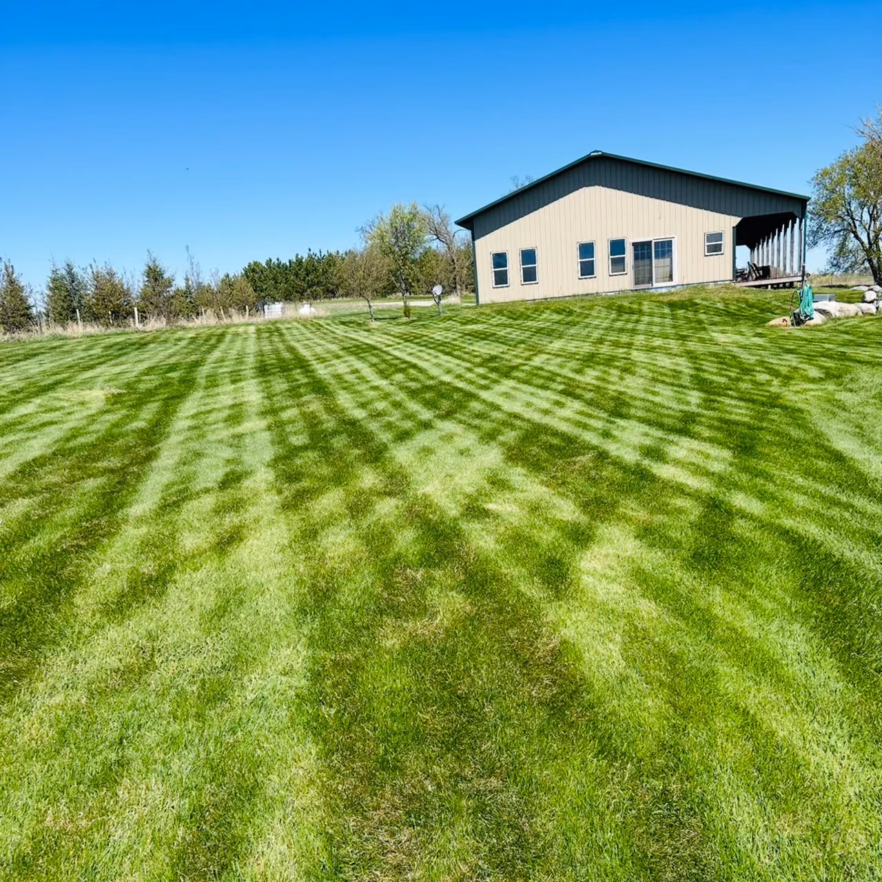 Professional weekly lawn mowing near me by Musolf Property Maintenance for a clean, well maintained lawn in Becker County Minnesota