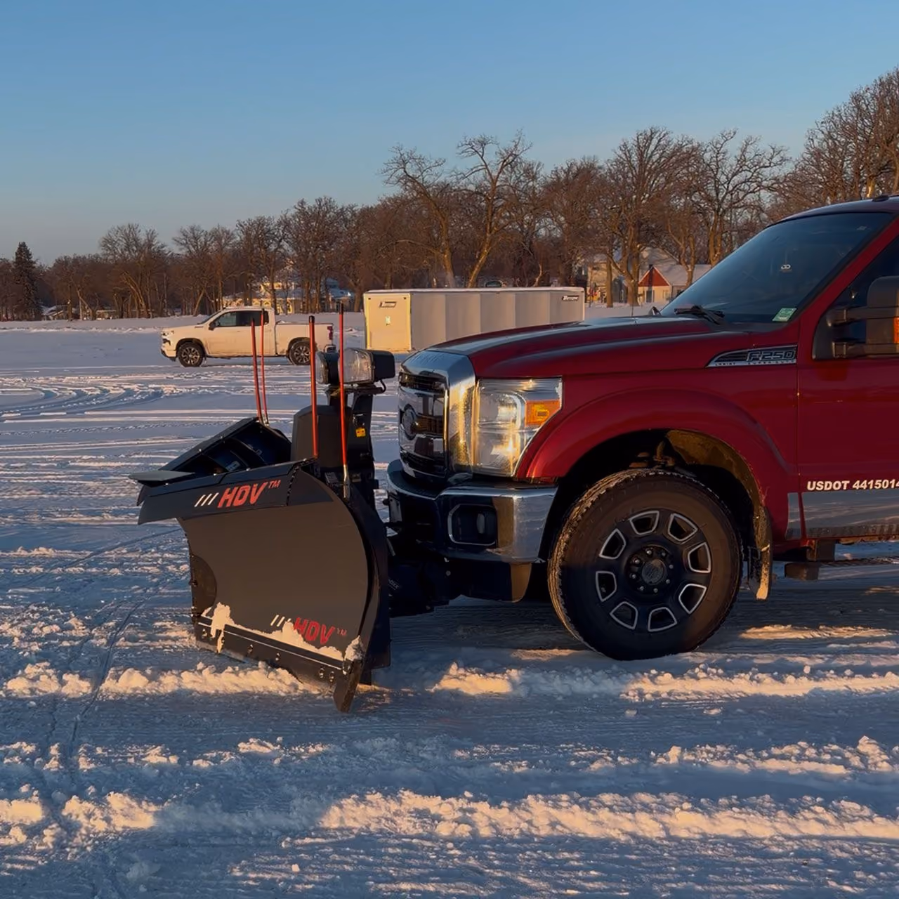 Professional snow removal by Musolf Property Maintenance using tractor mounted snow blowers in Detroit Lakes Minnesota
