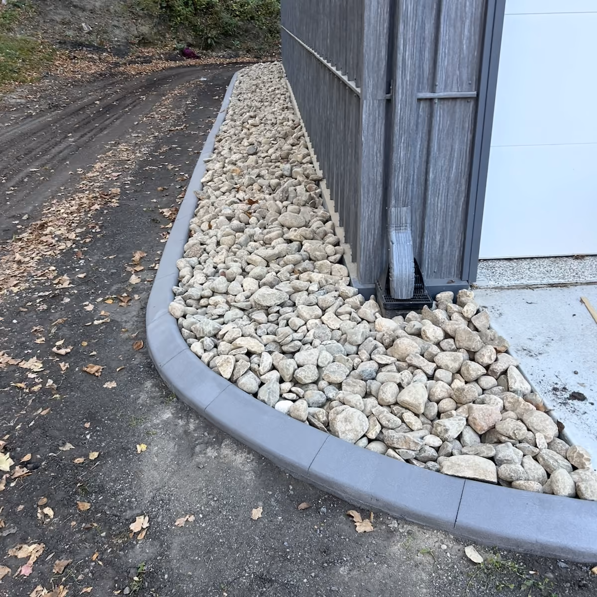 Decorative rock installation by Musolf Property Maintenance for clean, low maintenance landscaping in Detroit Lakes Minnesota near me