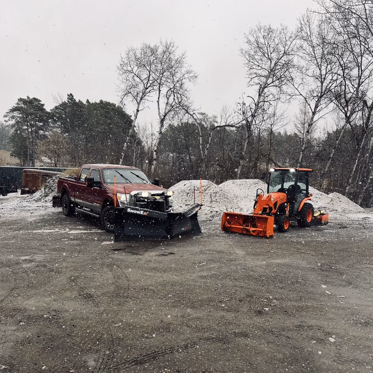 Musolf Property Maintenance company truck and tractor providing snow removal in Detroit Lakes Minnesota