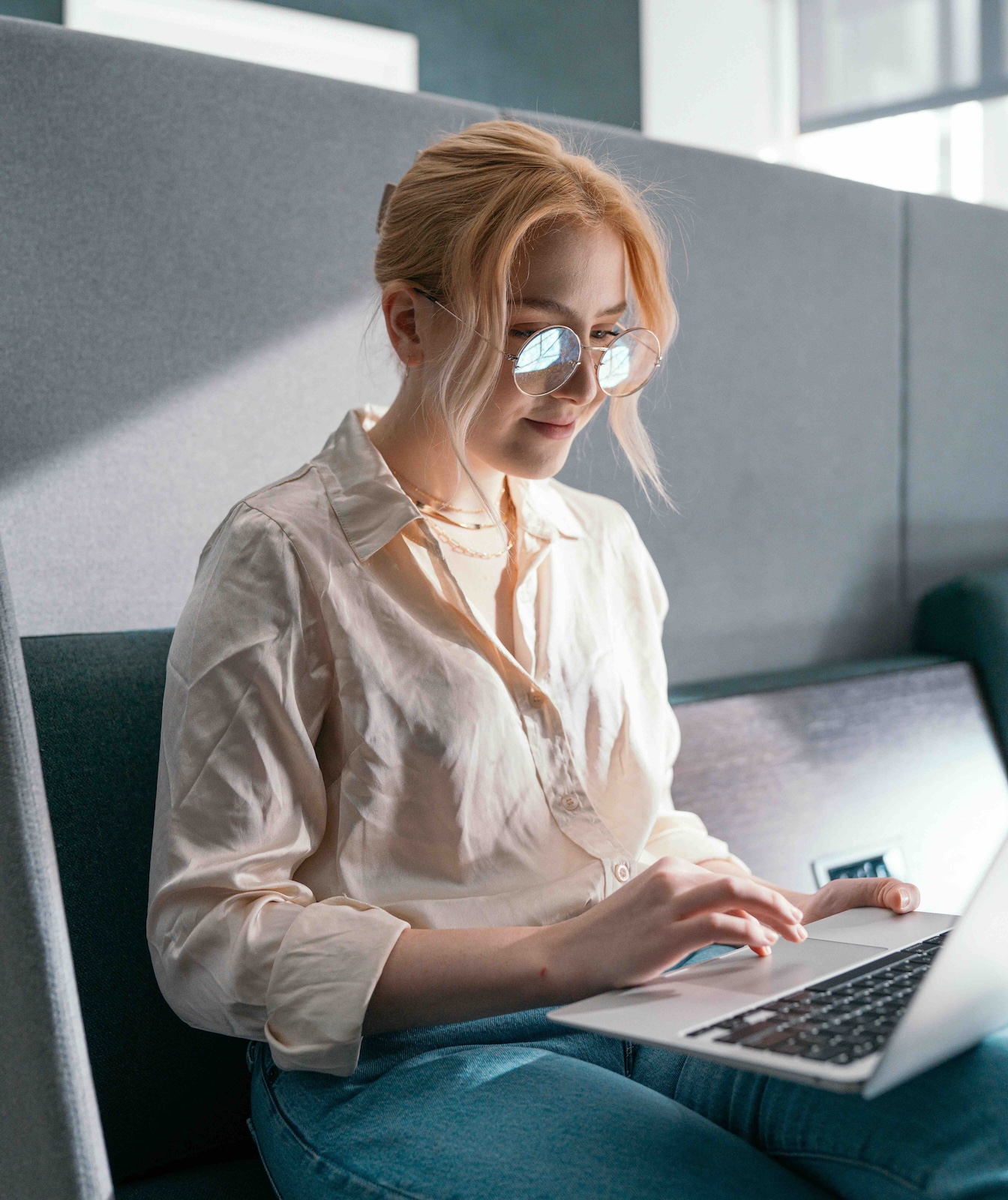 A woman working on a laptop