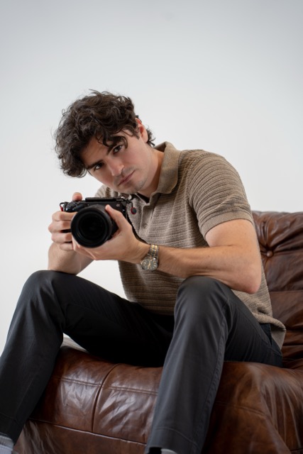 Leo Baralt, founder of Alt Bar Creative, with a camera