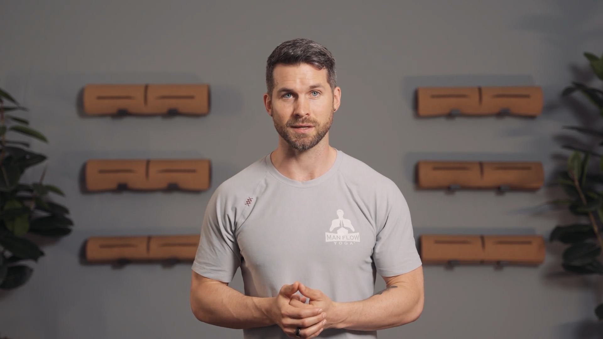 Dean Pohlman speaking to camera in the Man Flow Yoga founder story