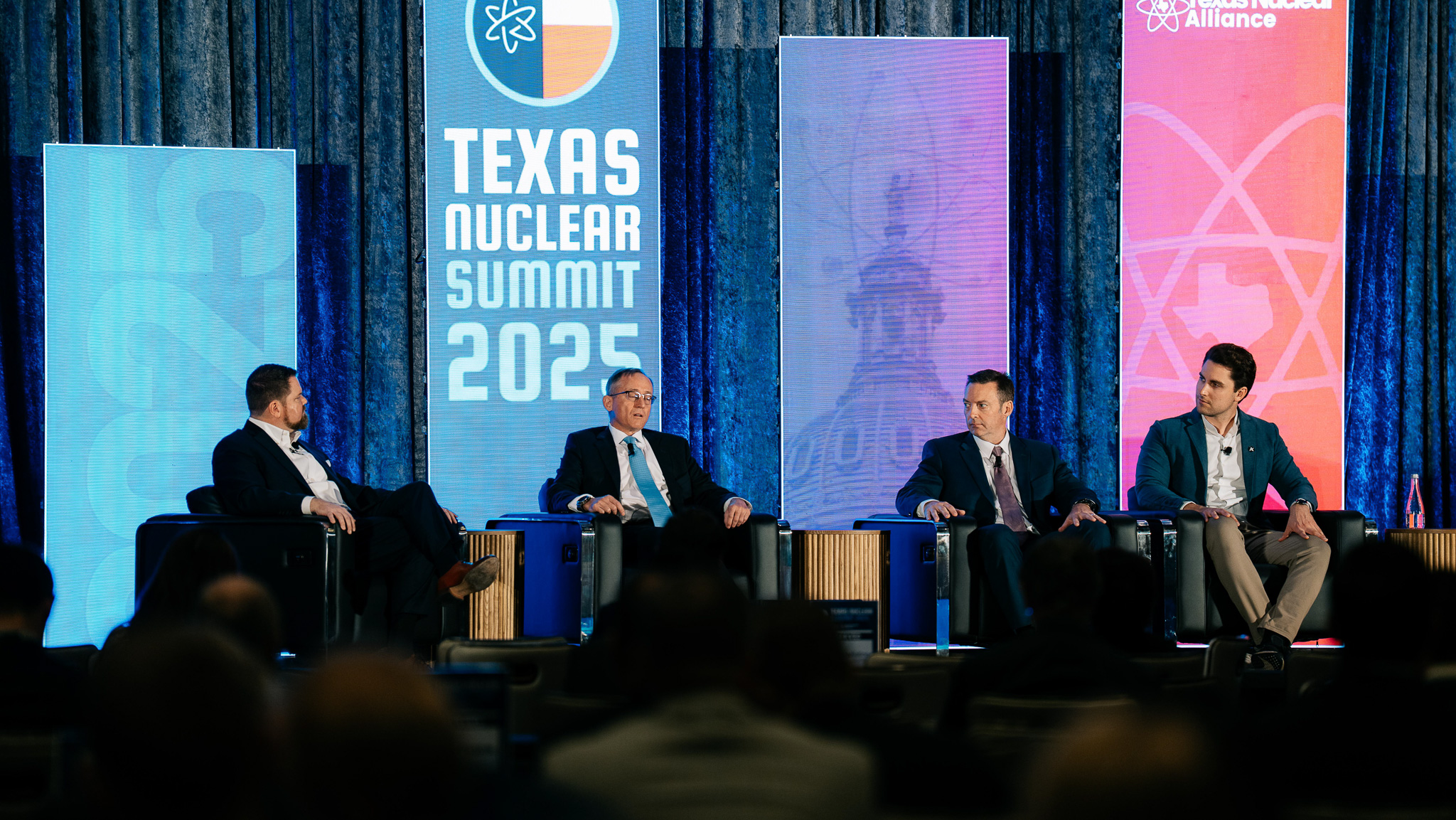 Speaker on stage at the 2025 Texas Nuclear Summit