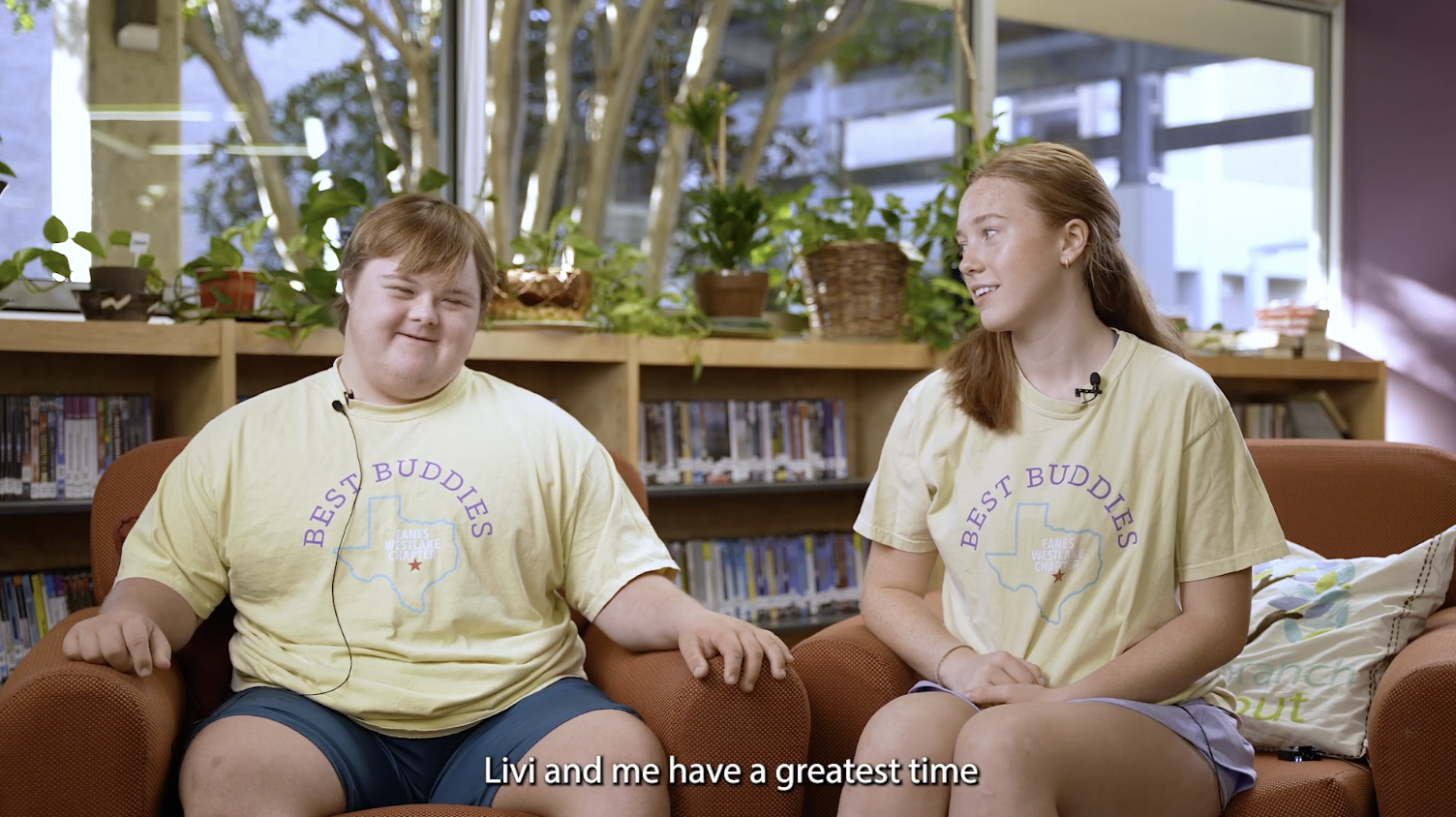 Two Best Buddies participants seated together during their interview
