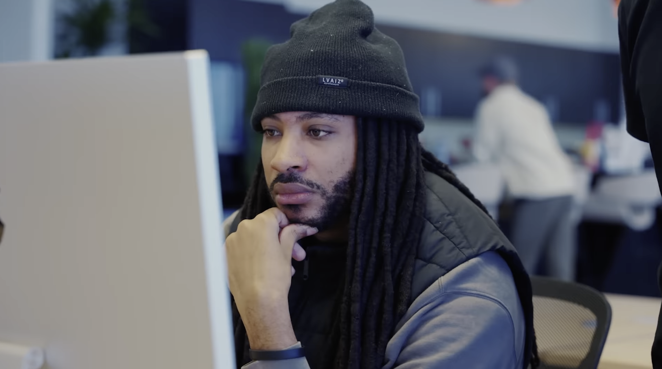 An attendee at a demo station during webAI's SXSW week