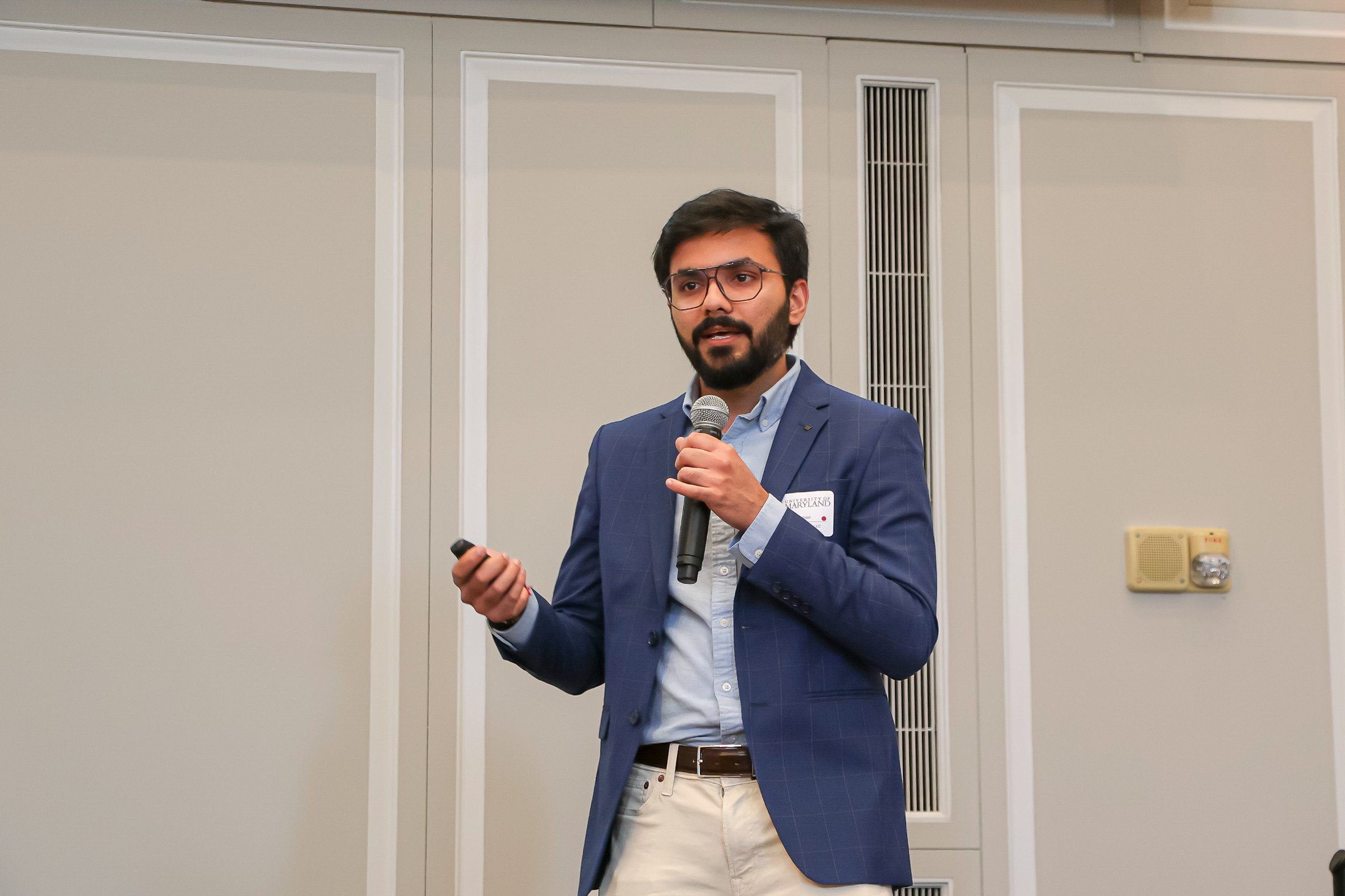 A founder delivering a quick pitch at the UMD Startup Showcase