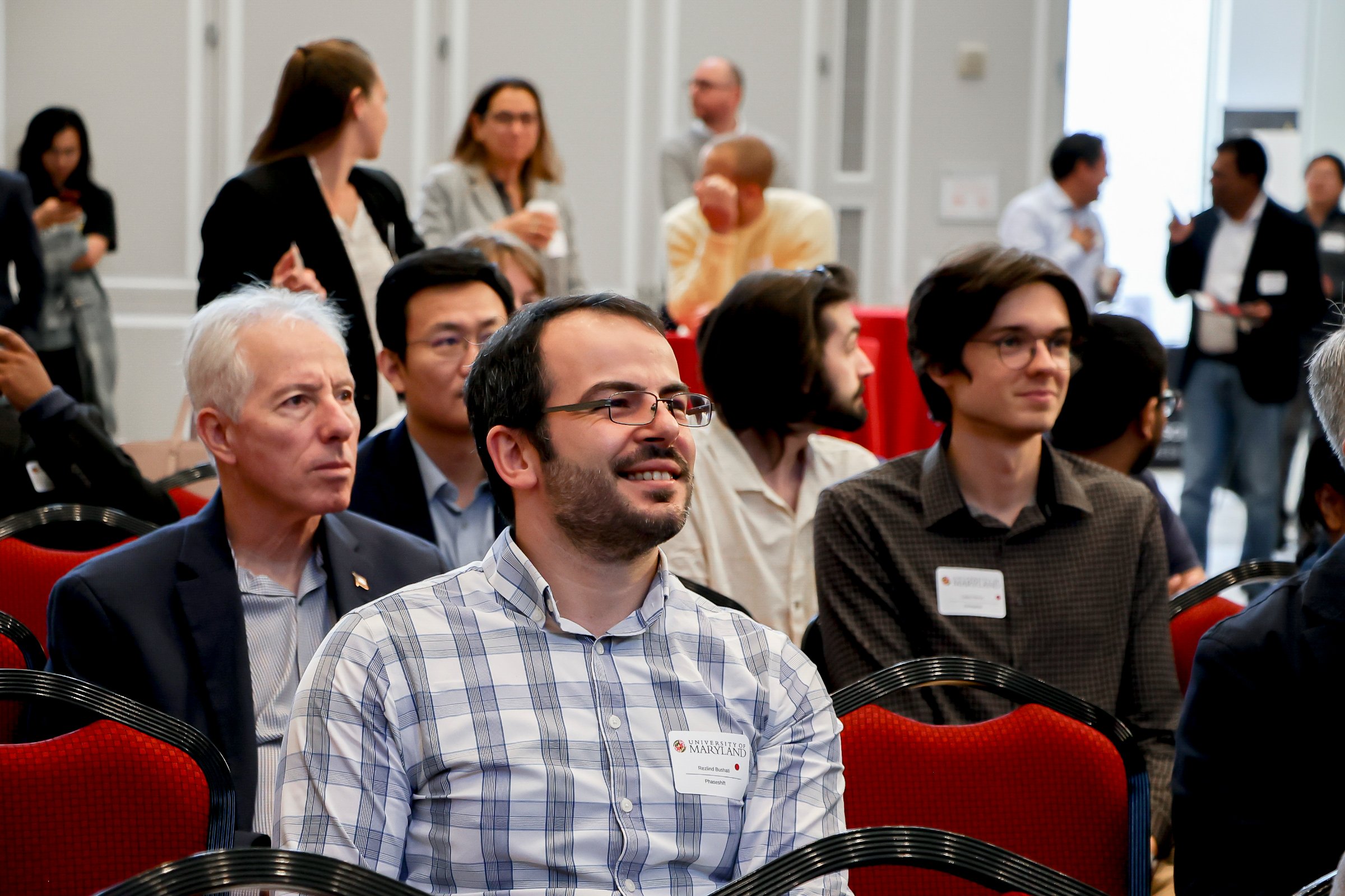 Attendees watching the quick pitch session