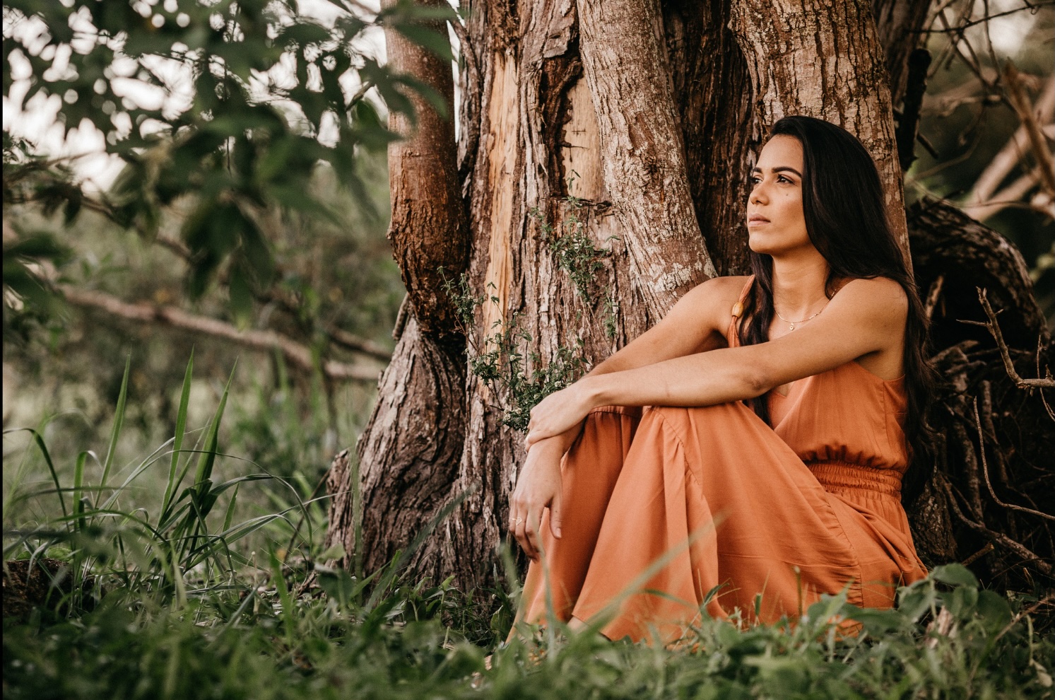 woman sitting in nature