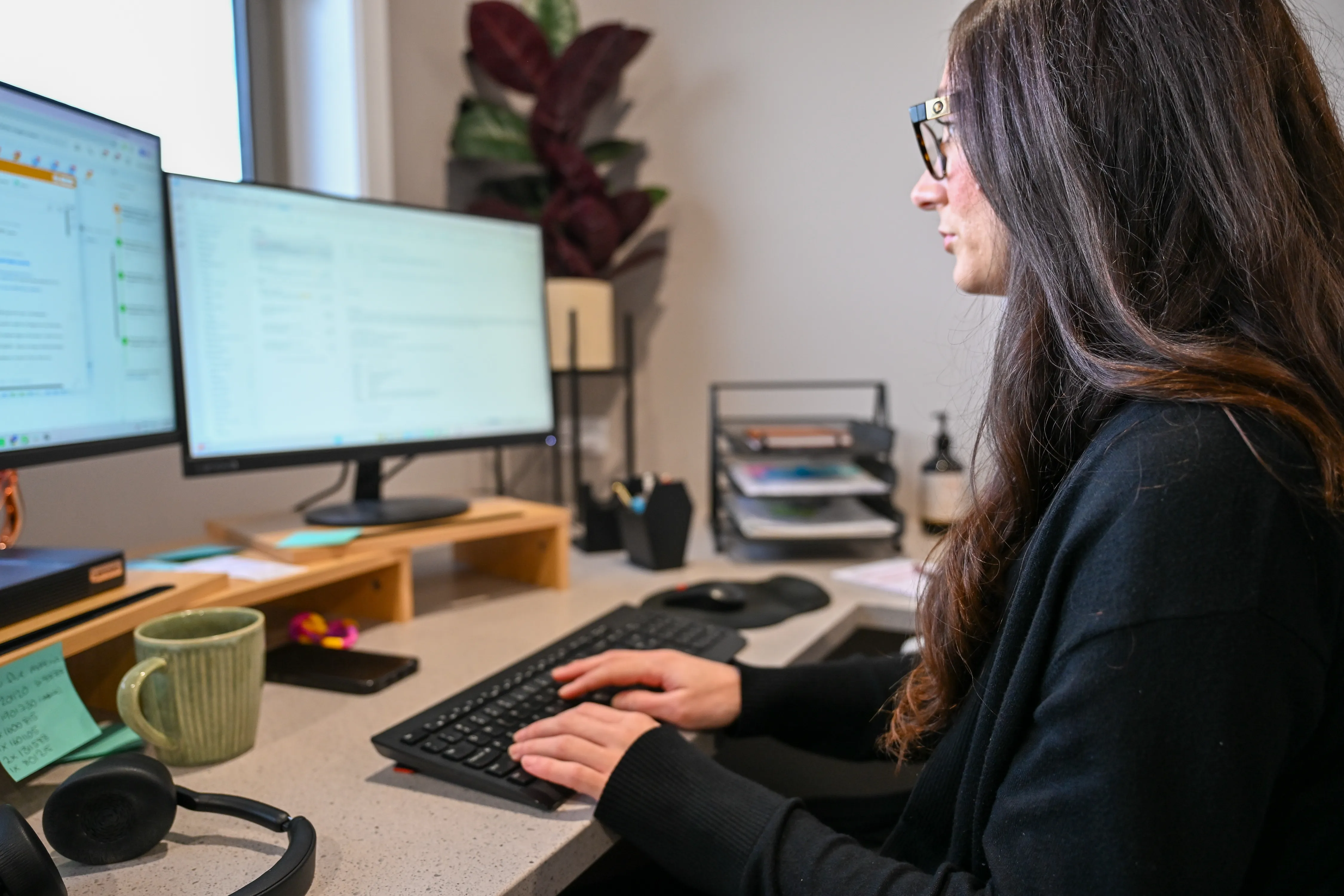 HomeSafeGV admin team member managing bookings at the Kialla office