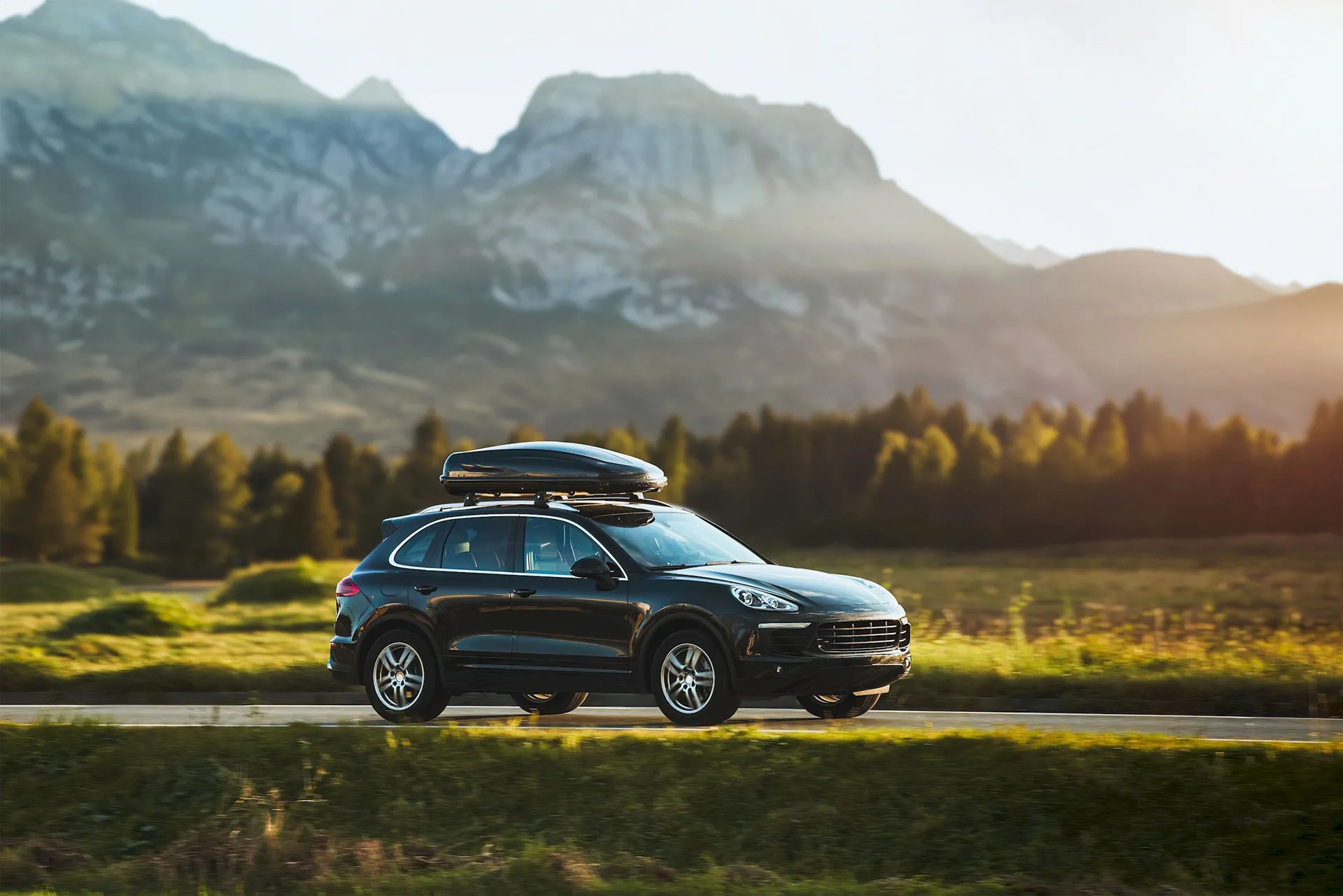 Family travelling with a loaded roof box