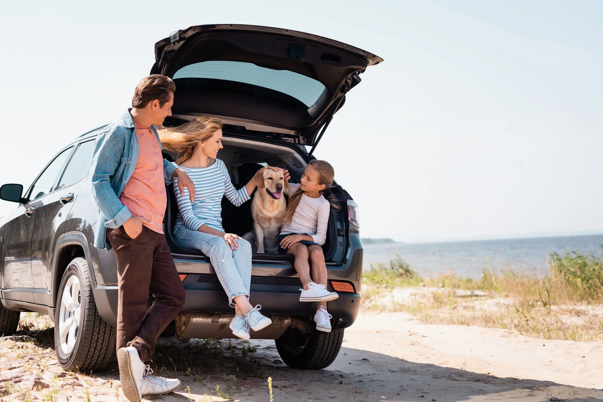 Family stopped on a road trip