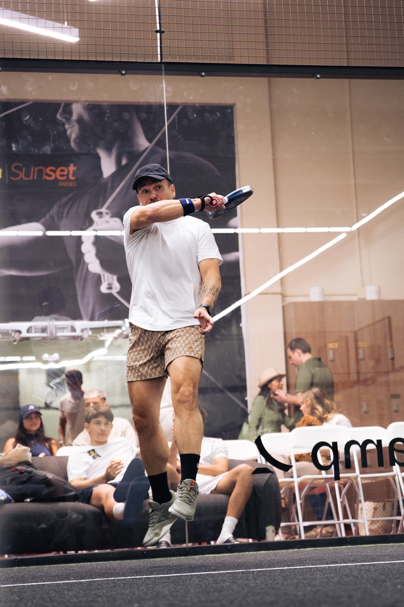 A Padner striking a forehand
