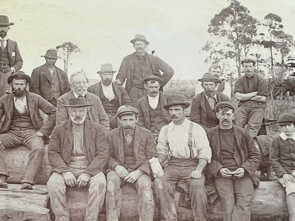 The men who built the Bulls bridge, photographed on the logs in July 1901